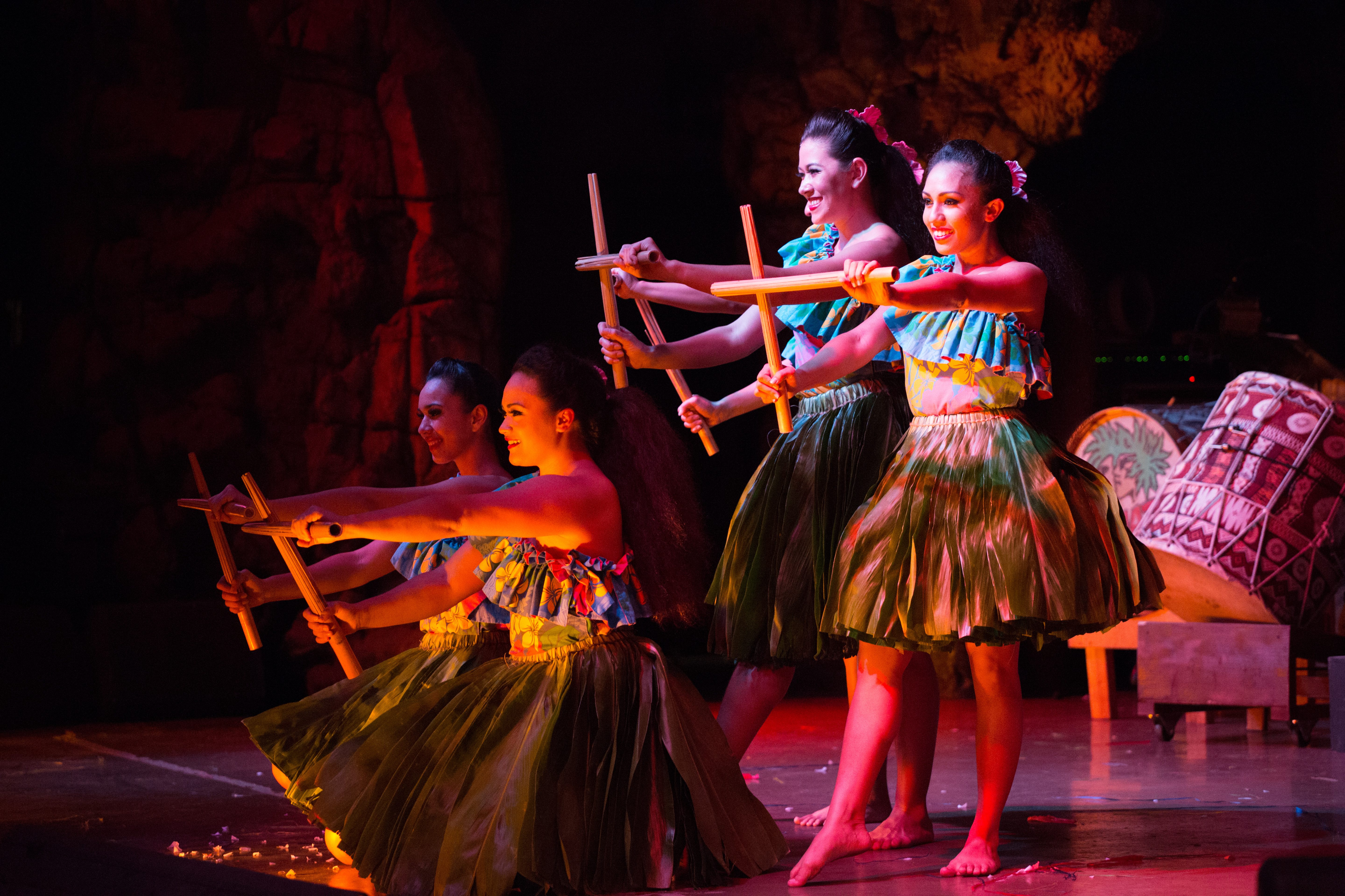 Four women on stage dancing