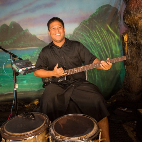 A man playing several instruments