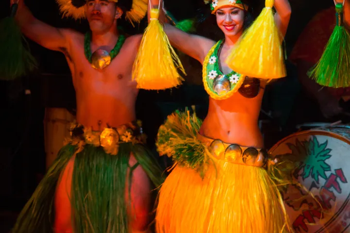 A man and woman dancing on stage