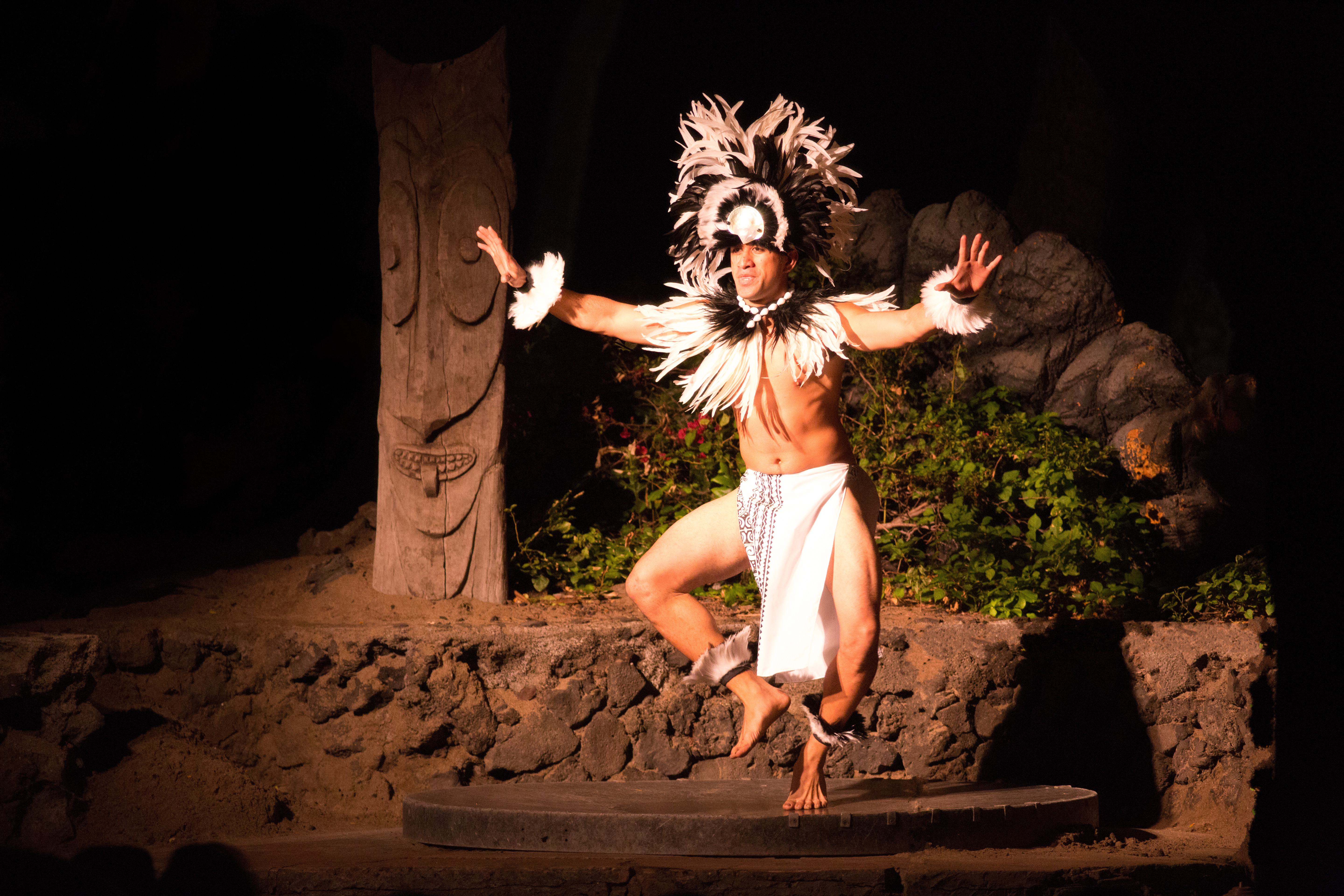 A man dancing alone on stage