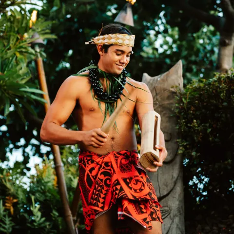 Spencir Bridges standing in a garden